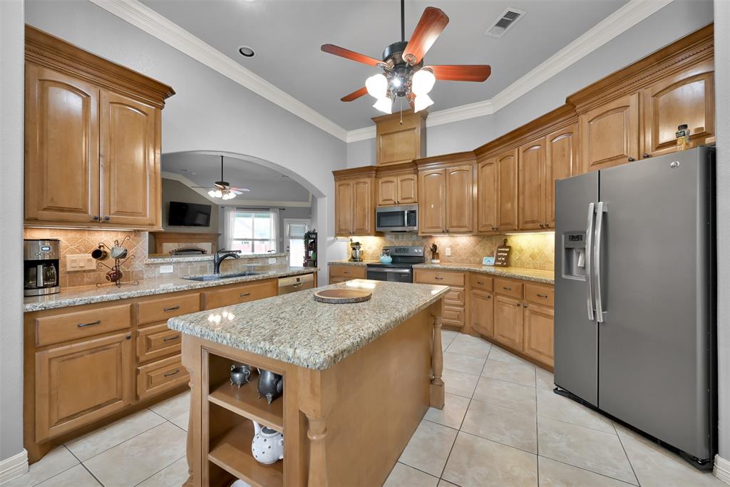Kitchen before - dated wooden cabinets